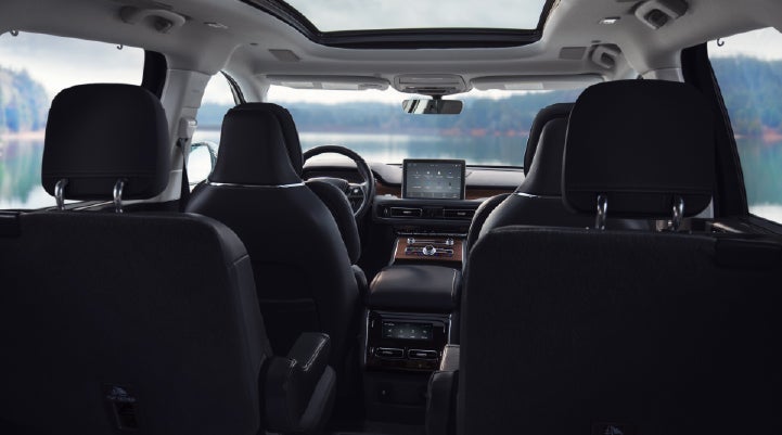 The interior of a 2024 Lincoln Aviator® SUV from behind the second row | Beck Lincoln in Palatka FL