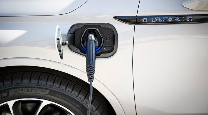 An electric charger is shown plugged into the charging port of a Lincoln Corsair® Grand Touring
model. | Beck Lincoln in Palatka FL